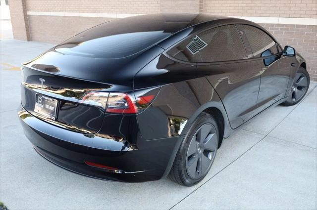 used 2023 Tesla Model 3 car, priced at $20,297
