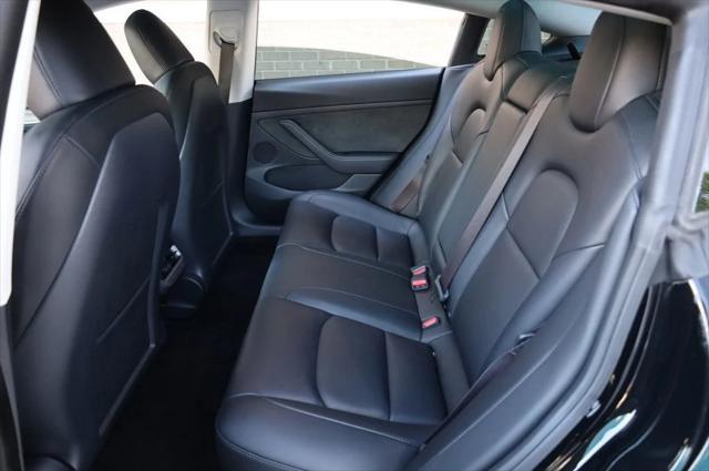 used 2023 Tesla Model 3 car, priced at $20,297