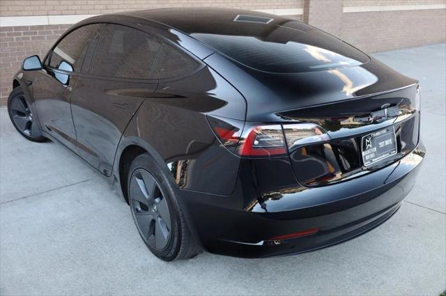 used 2023 Tesla Model 3 car, priced at $20,297