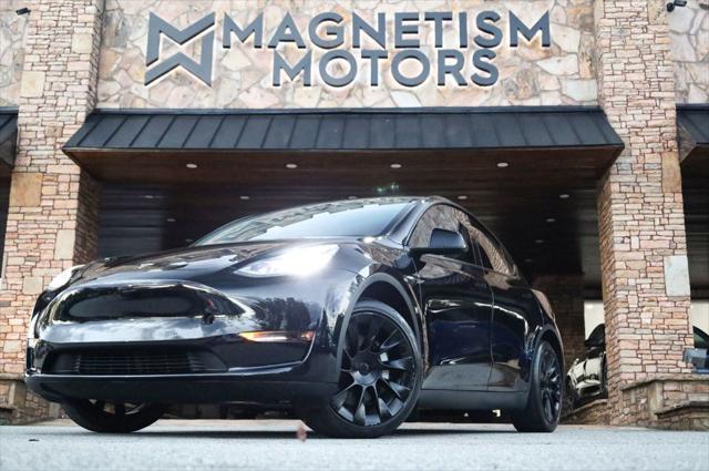 used 2021 Tesla Model Y car, priced at $28,497