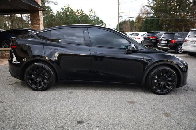 used 2021 Tesla Model Y car, priced at $28,497