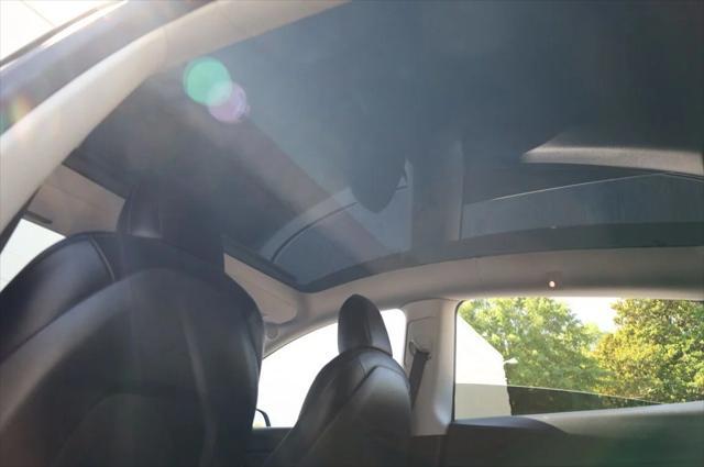 used 2022 Tesla Model Y car, priced at $27,997