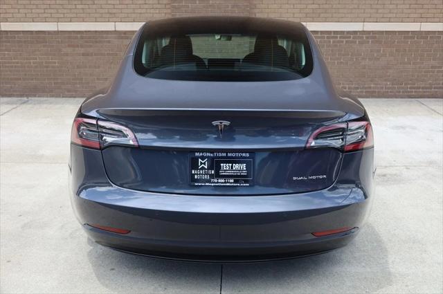 used 2022 Tesla Model 3 car, priced at $25,497