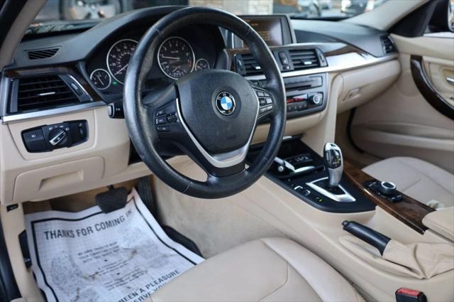 used 2014 BMW 335 car, priced at $10,997