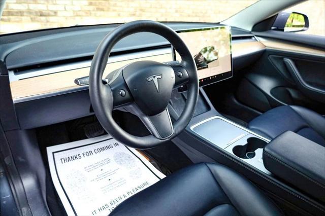 used 2023 Tesla Model 3 car, priced at $22,497