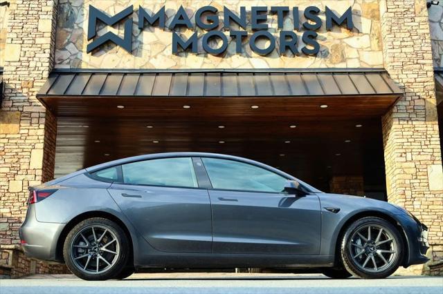 used 2023 Tesla Model 3 car, priced at $22,497