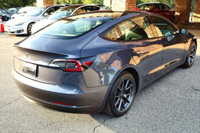 used 2023 Tesla Model 3 car, priced at $22,497