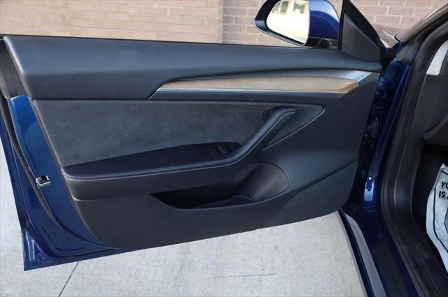 used 2022 Tesla Model 3 car, priced at $20,297