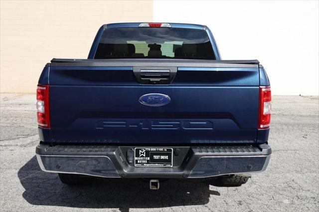 used 2018 Ford F-150 car, priced at $23,497