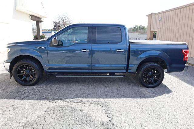 used 2018 Ford F-150 car, priced at $23,497