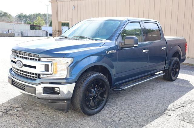 used 2018 Ford F-150 car, priced at $23,497