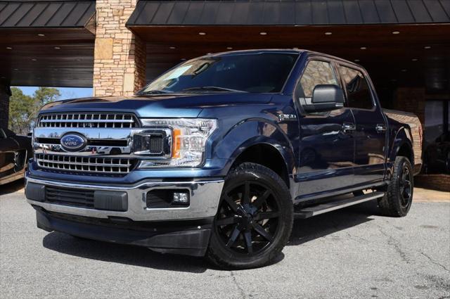 used 2018 Ford F-150 car, priced at $23,497