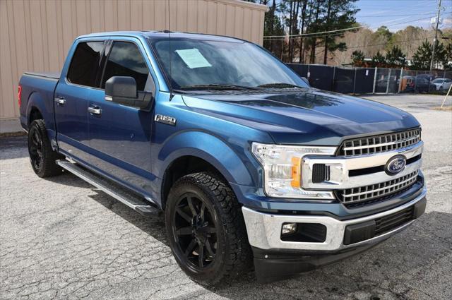 used 2018 Ford F-150 car, priced at $23,497