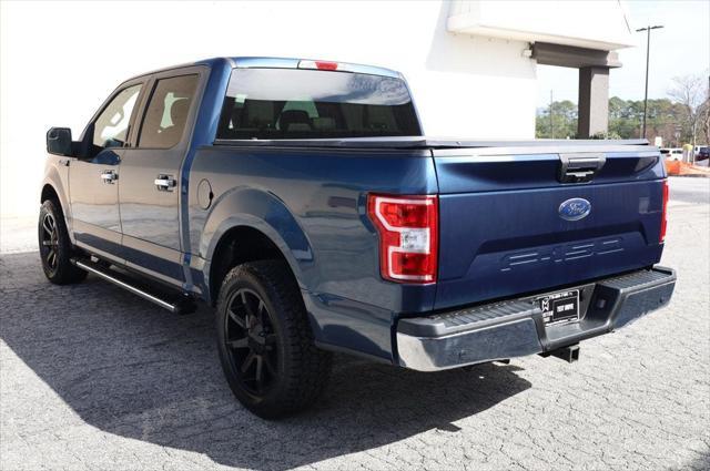 used 2018 Ford F-150 car, priced at $23,497