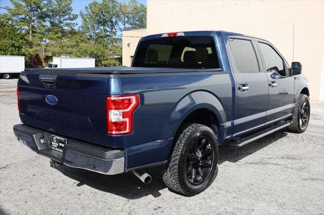 used 2018 Ford F-150 car, priced at $23,497