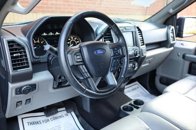 used 2018 Ford F-150 car, priced at $23,497