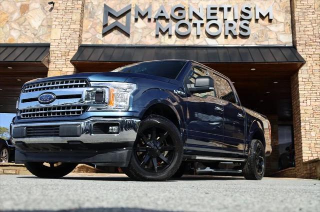 used 2018 Ford F-150 car, priced at $23,497