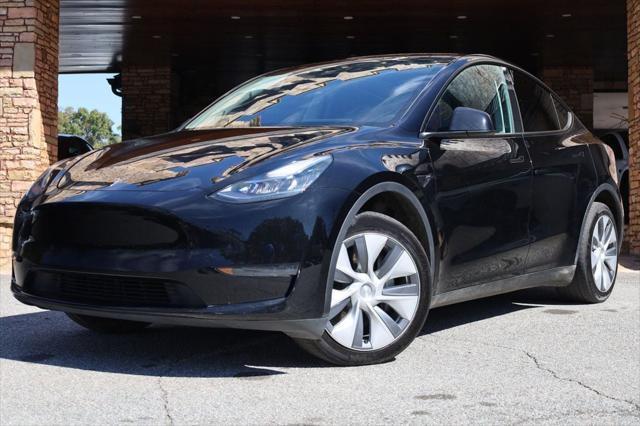 used 2023 Tesla Model Y car, priced at $27,497