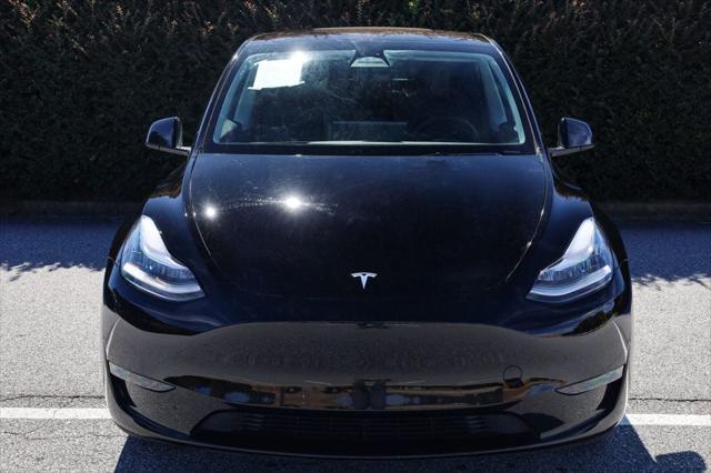 used 2023 Tesla Model Y car, priced at $27,497