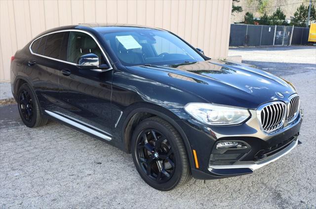 used 2021 BMW X4 car, priced at $27,797