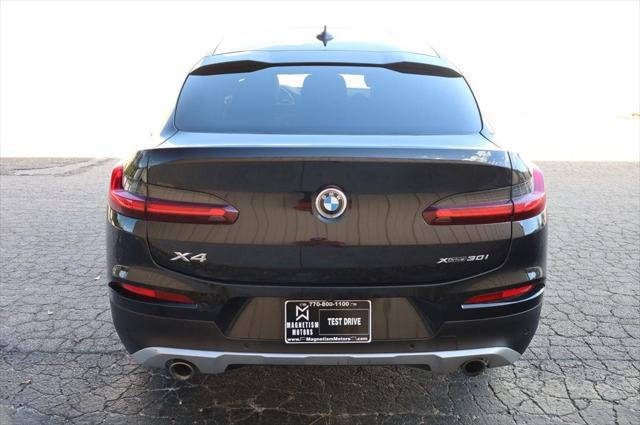 used 2021 BMW X4 car, priced at $27,797