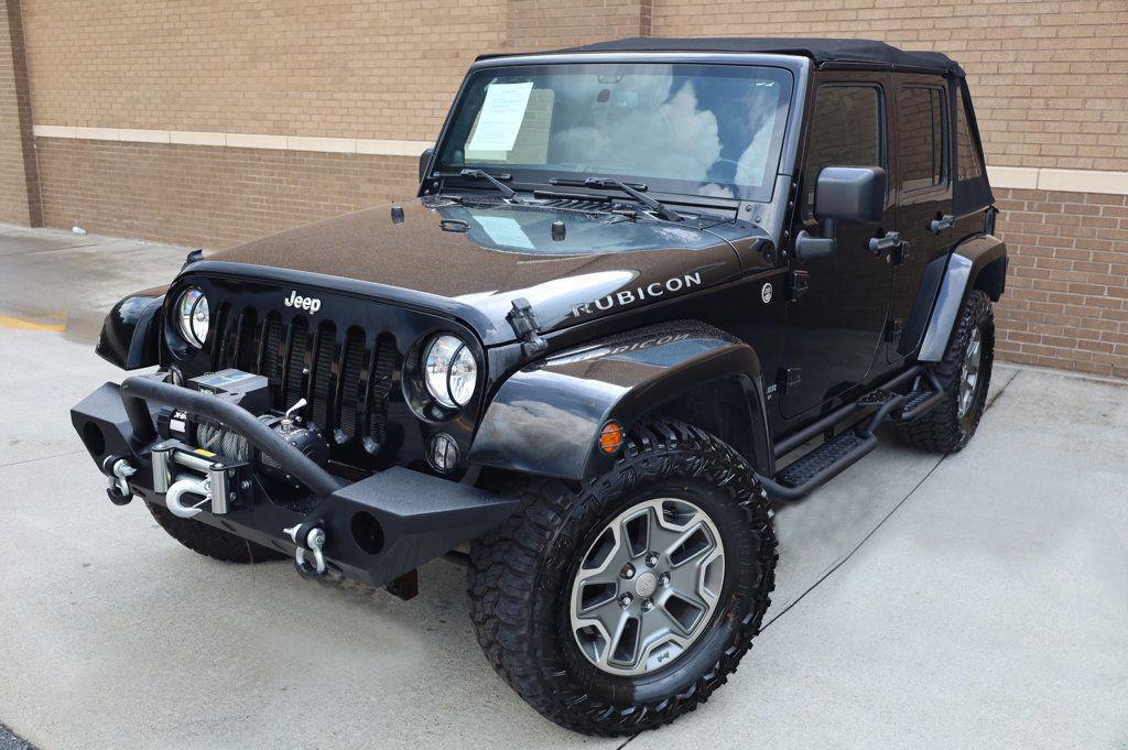 used 2014 Jeep Wrangler Unlimited car, priced at $16,997