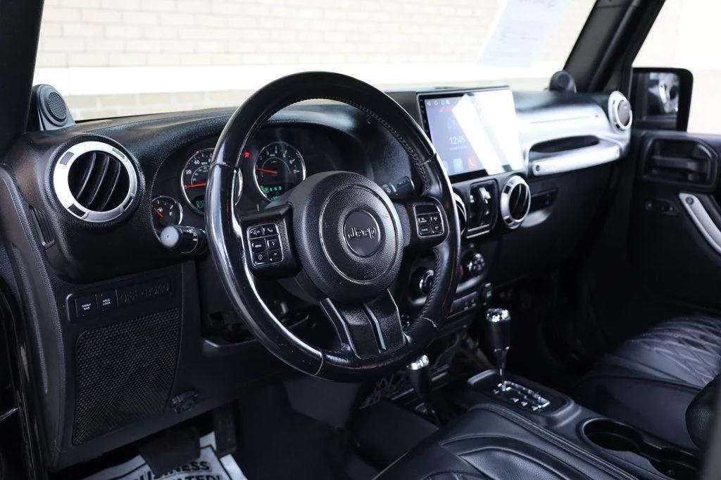 used 2014 Jeep Wrangler Unlimited car, priced at $16,997