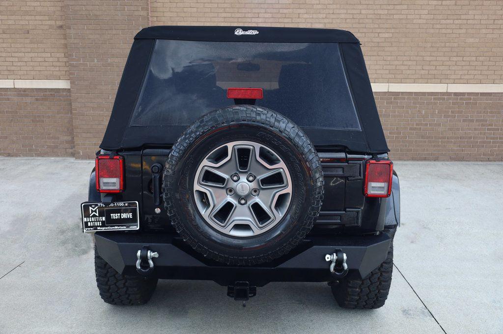 used 2014 Jeep Wrangler Unlimited car, priced at $16,997