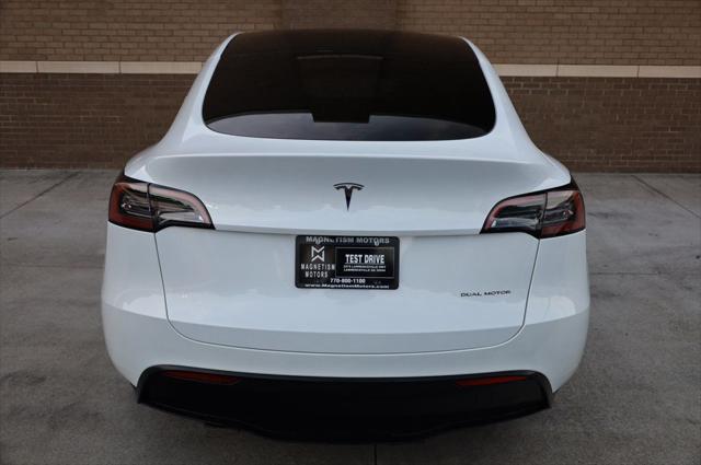 used 2021 Tesla Model Y car, priced at $27,497