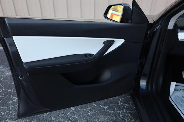 used 2021 Tesla Model Y car, priced at $27,497