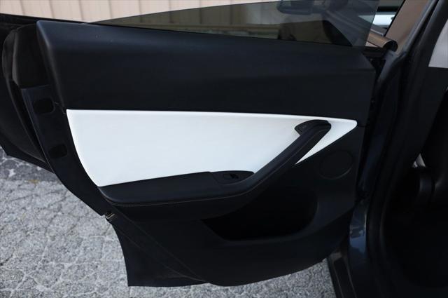 used 2021 Tesla Model Y car, priced at $27,497