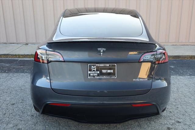 used 2021 Tesla Model Y car, priced at $27,497