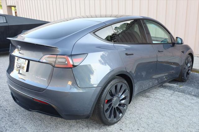 used 2021 Tesla Model Y car, priced at $27,497