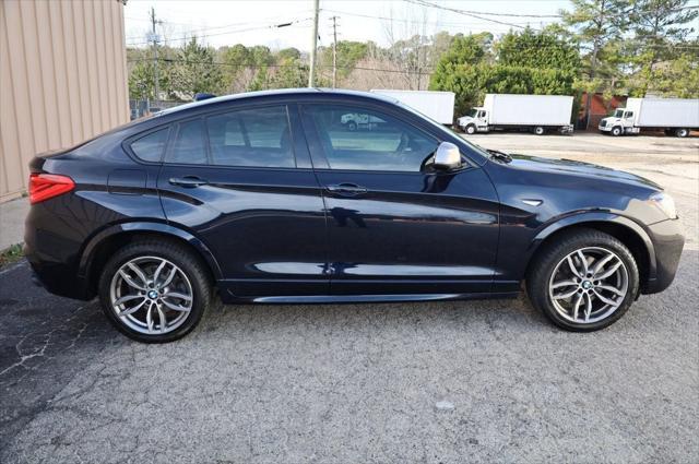 used 2018 BMW X4 car, priced at $24,997