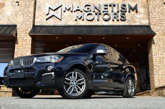 used 2018 BMW X4 car, priced at $24,997