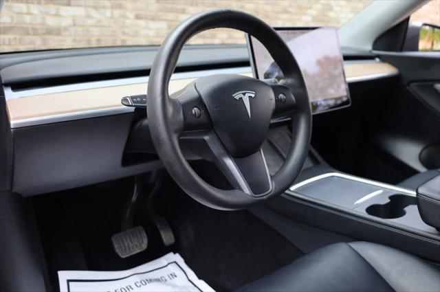 used 2021 Tesla Model Y car, priced at $27,997