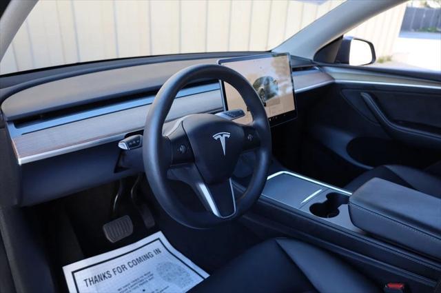 used 2023 Tesla Model Y car, priced at $28,497