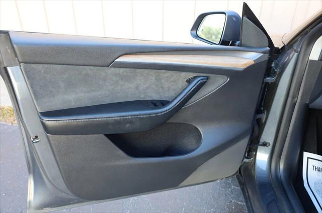 used 2023 Tesla Model Y car, priced at $28,497