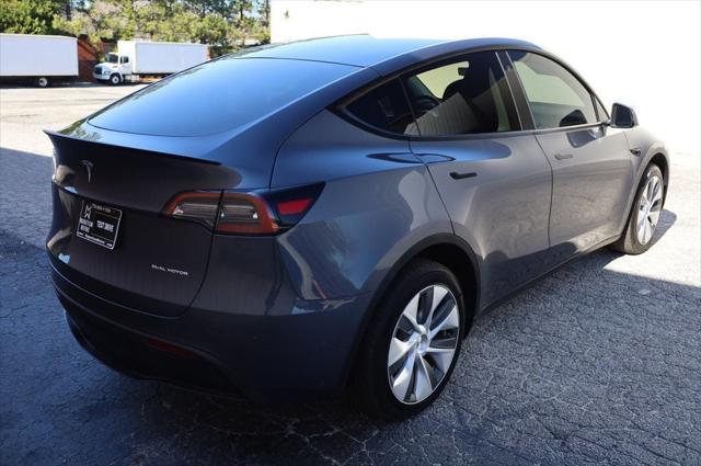 used 2023 Tesla Model Y car, priced at $28,497