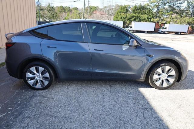 used 2023 Tesla Model Y car, priced at $28,497