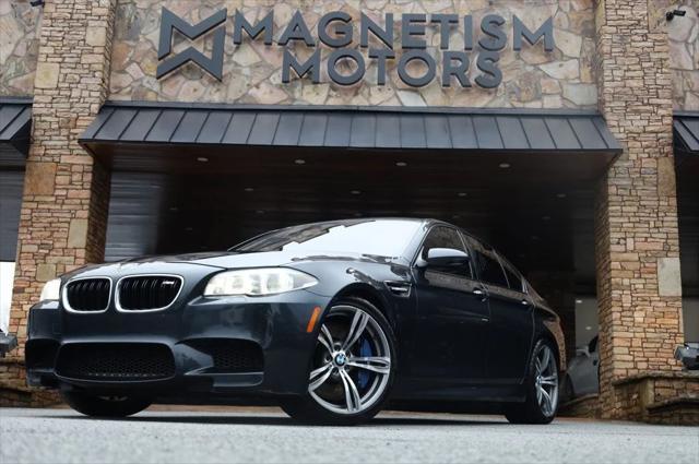 used 2014 BMW M5 car, priced at $24,797