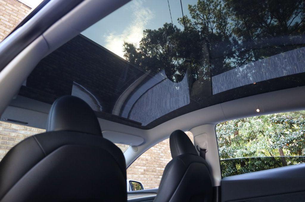 used 2023 Tesla Model Y car, priced at $32,997
