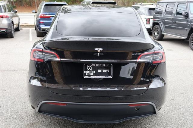 used 2023 Tesla Model Y car, priced at $25,997