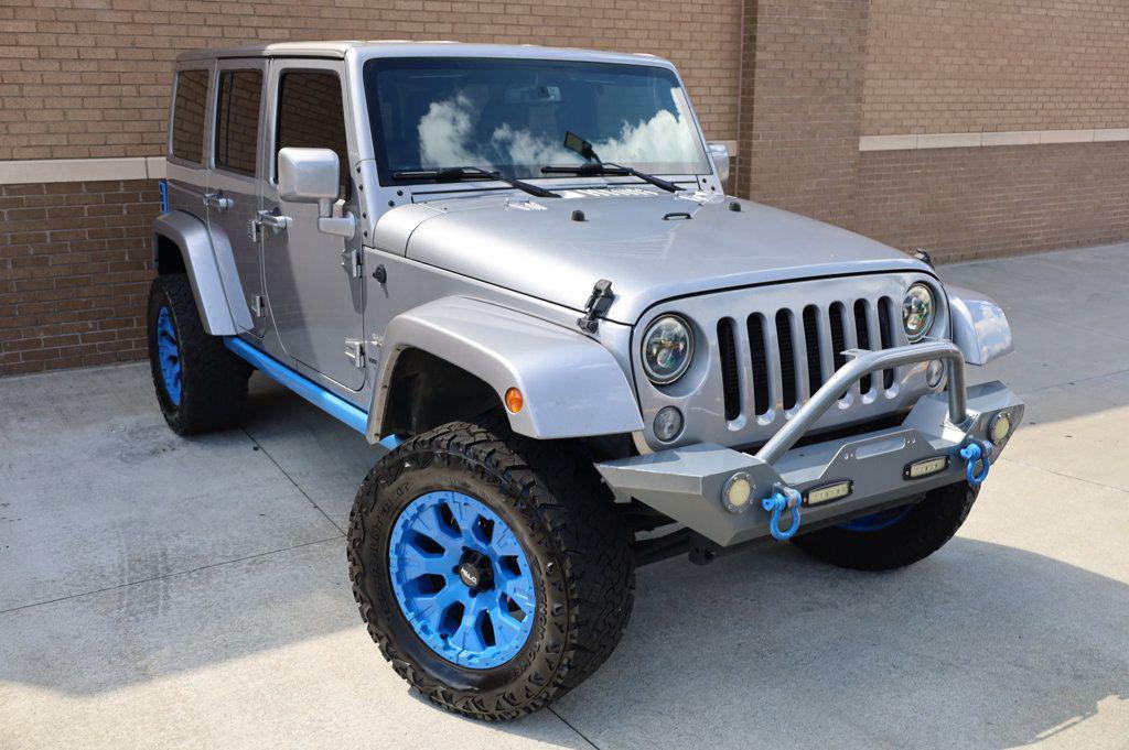 used 2016 Jeep Wrangler Unlimited car, priced at $14,987