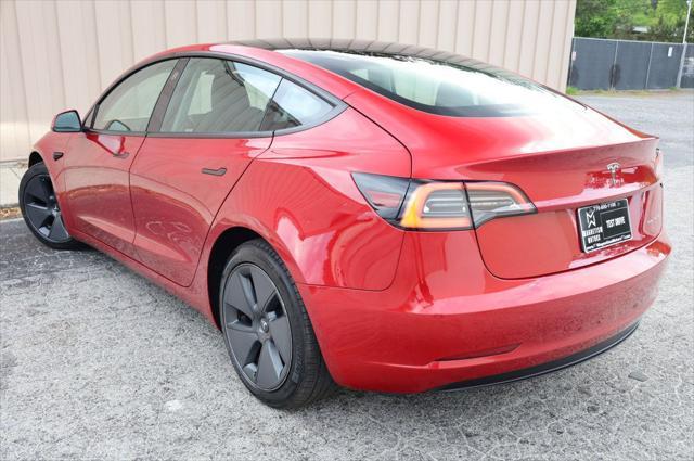 used 2023 Tesla Model 3 car, priced at $25,497