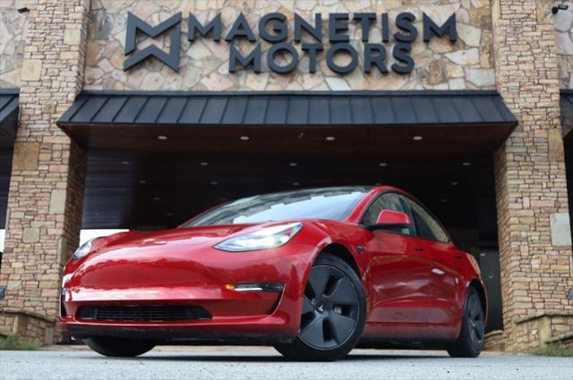 used 2023 Tesla Model 3 car, priced at $25,497