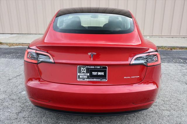 used 2023 Tesla Model 3 car, priced at $25,497