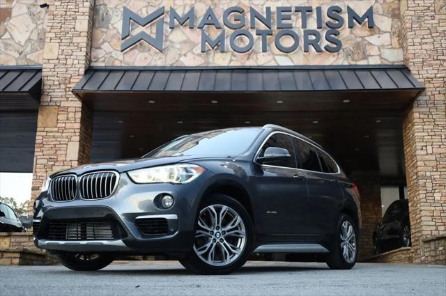 used 2016 BMW X1 car, priced at $11,497