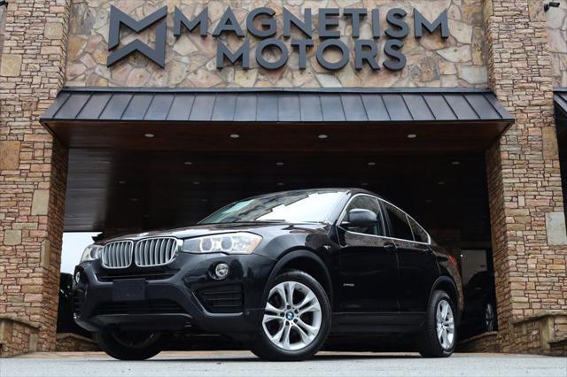 used 2016 BMW X4 car, priced at $14,997