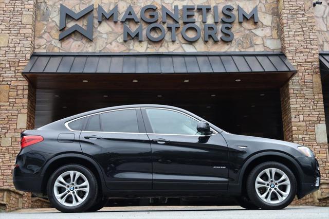 used 2016 BMW X4 car, priced at $14,997